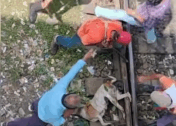 M1709011 Posting for journalistic purposes only train track workers coming t